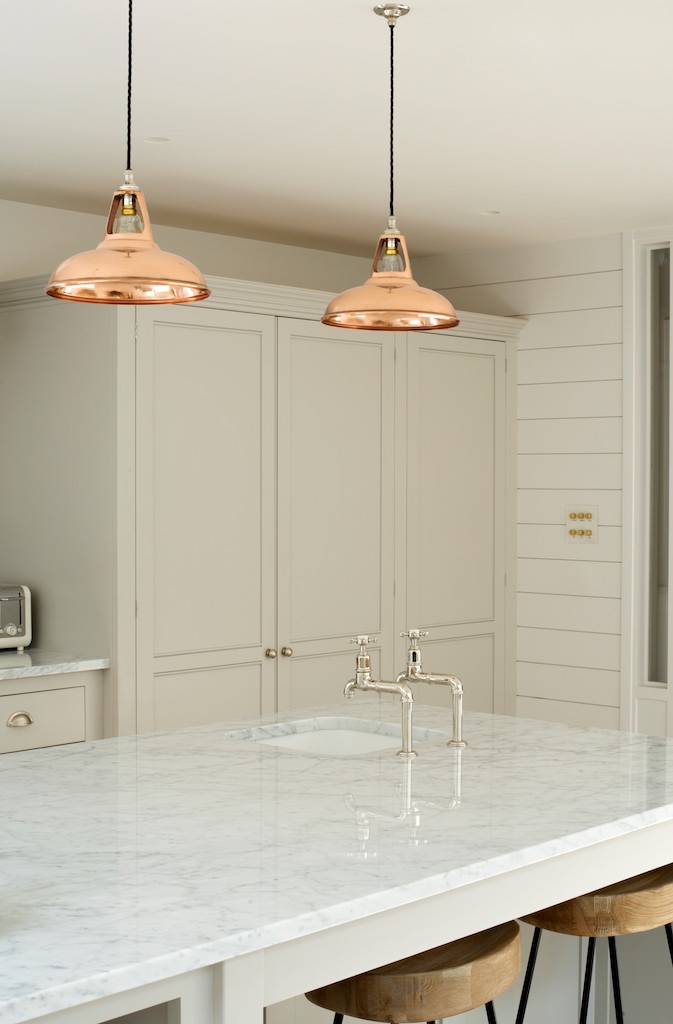 Shiny polished Carrara marble in the very cool Clapham Kitchen, natural materials just felt right in this room.