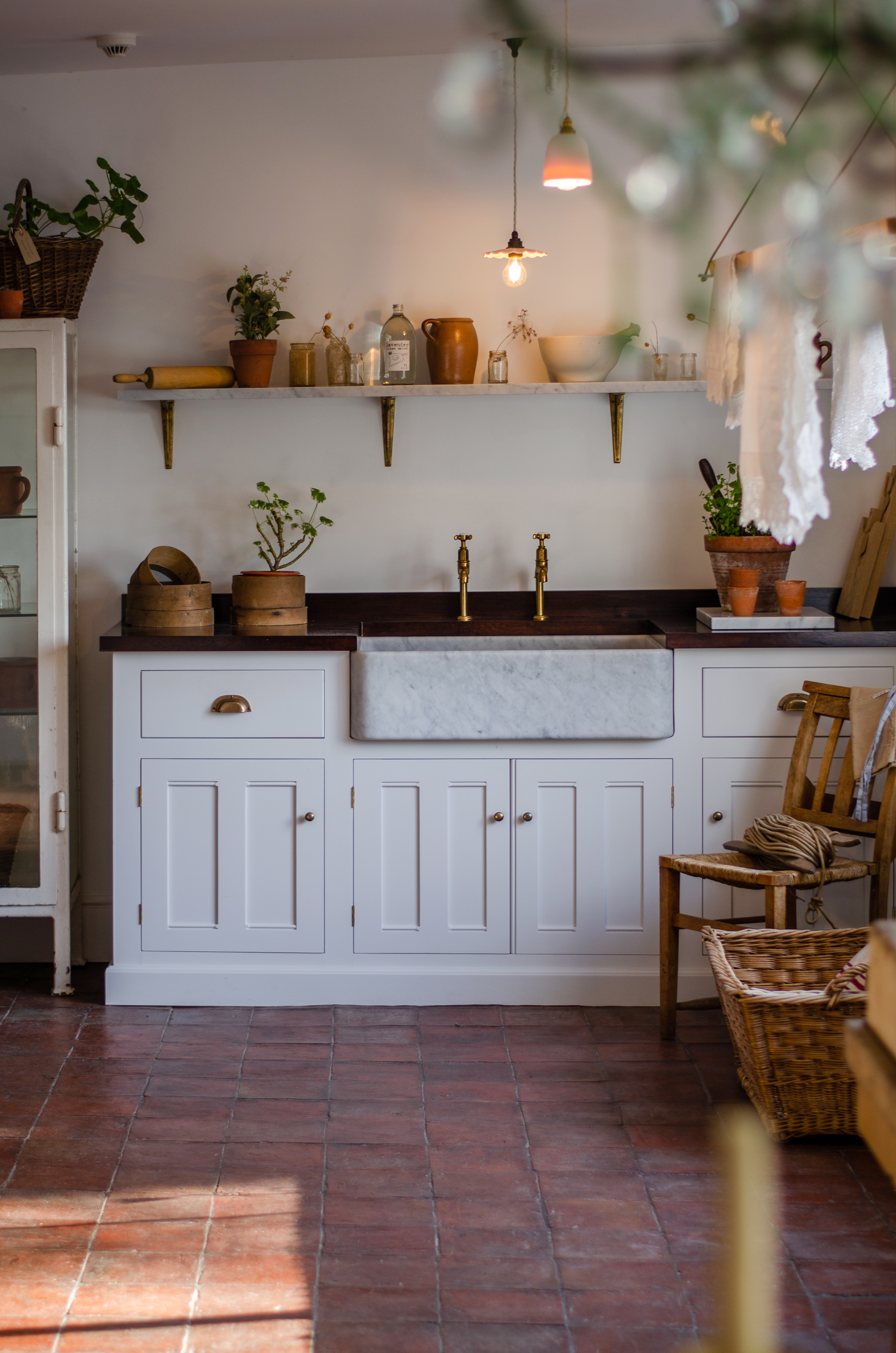 Our grand Classic Millhouse Scullery Kitchen accentuated with plenty of greenery.
