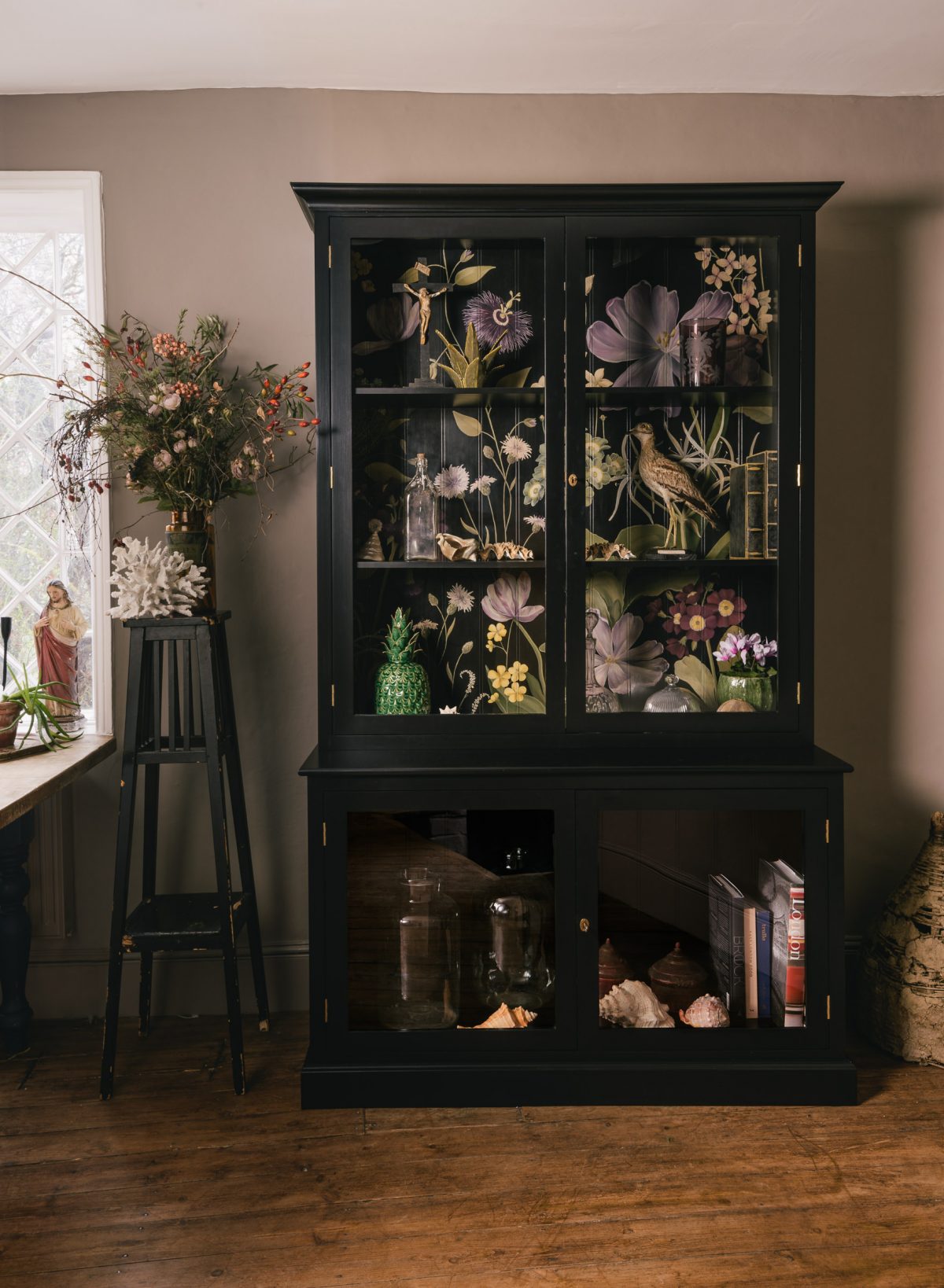‘The Botanical' design is so full of life and colour and we especially love it paired with a black painted cupboard.