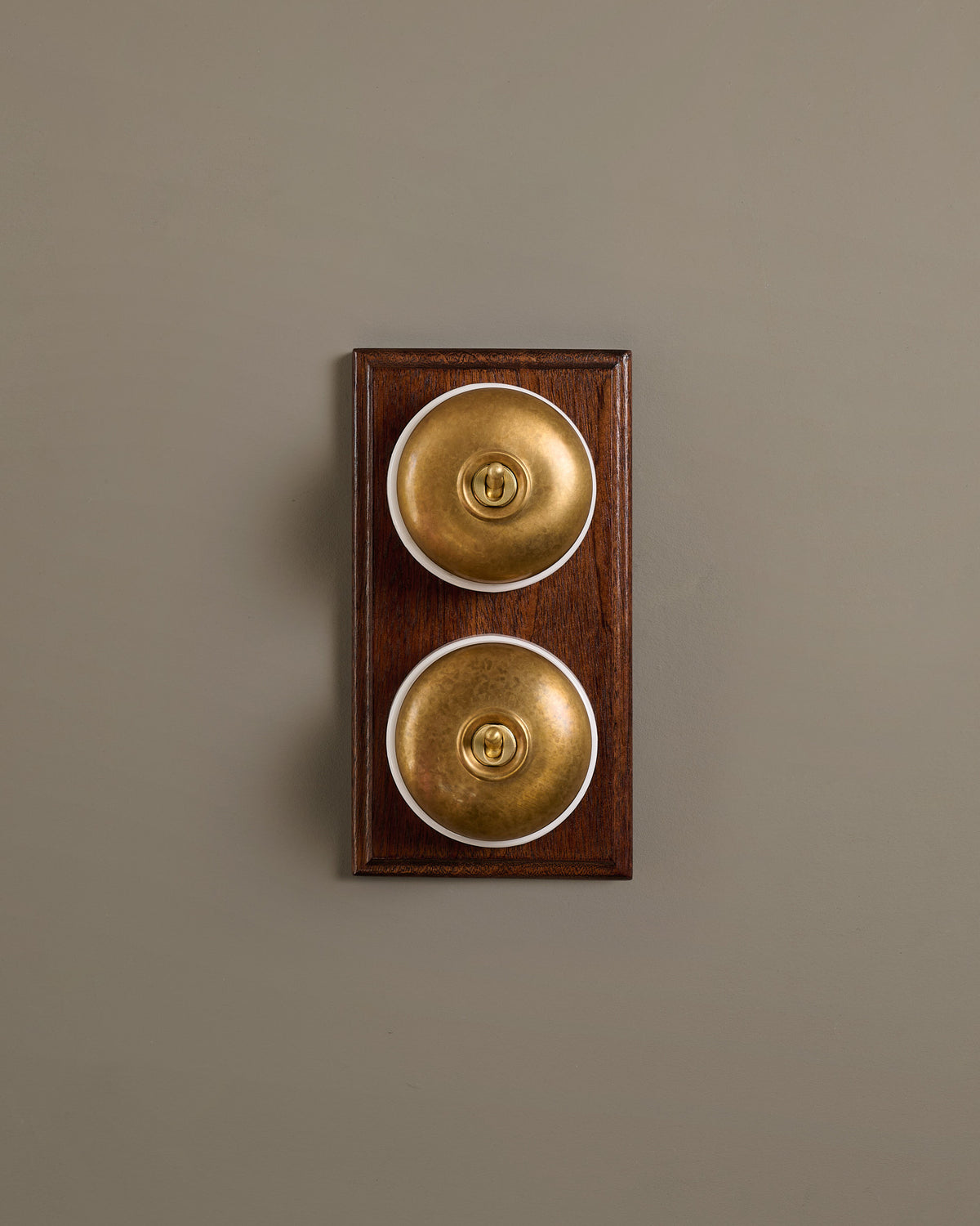 The Dolly Toggle Switch (2 Gang & Mahogany Finish Pattress) - Aged Brass with White Base. TEST