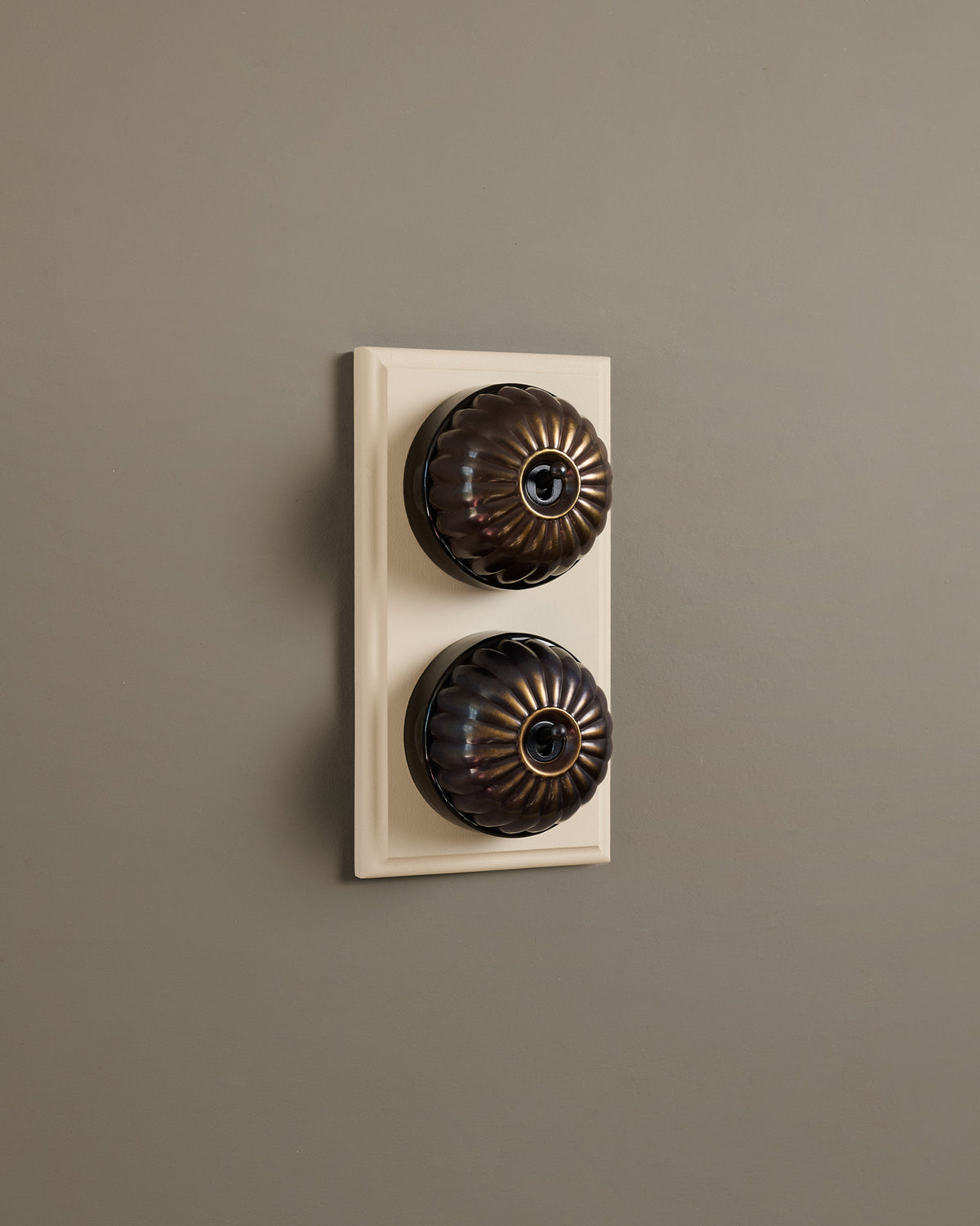 The Jelly Toggle Switch (2 Gang & Primed Maple Pattress) - Oxidised Brass with Black Base. TEST