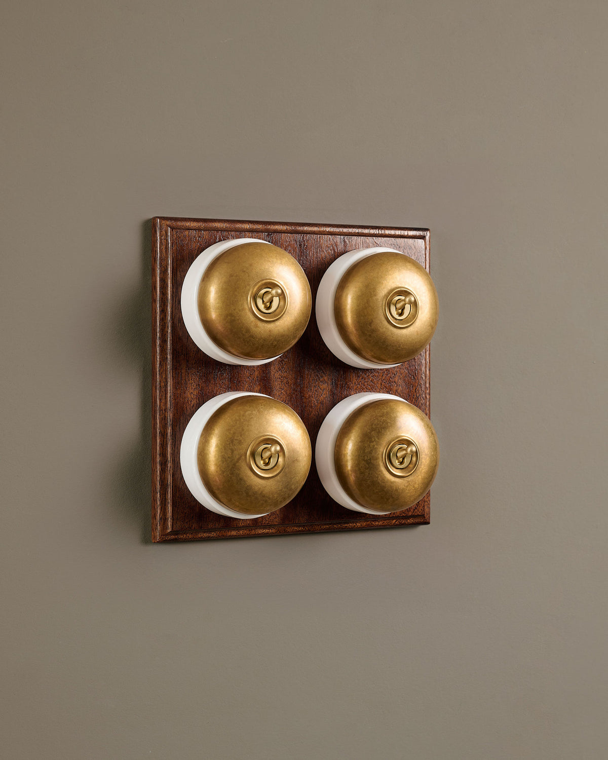 The Dolly Toggle Switch (4 Gang Bank & Mahogany Finish Pattress) - Aged Brass with White Base. TEST