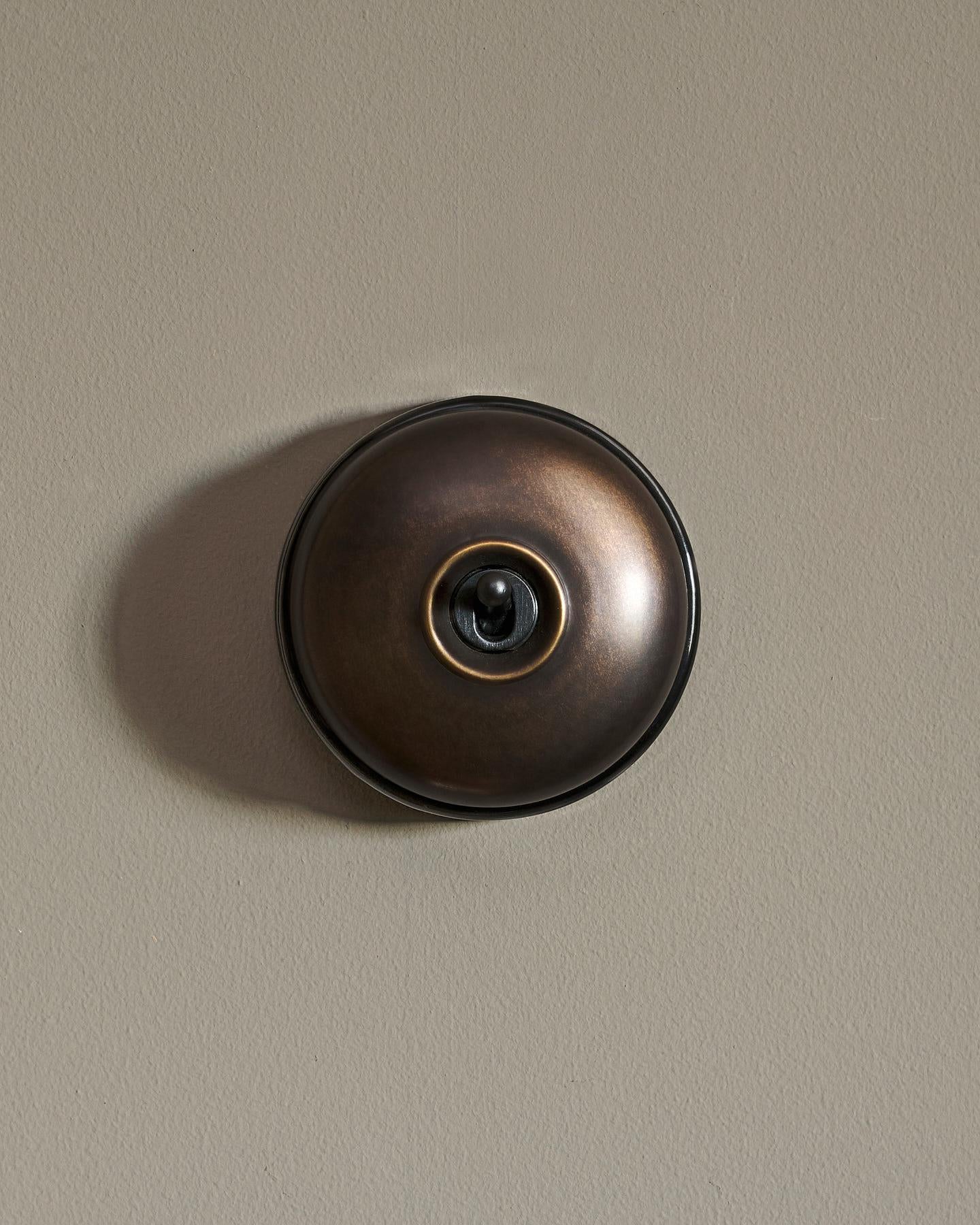 The Dolly Toggle Switch - Oxidised Brass, Black Base, Intermediate