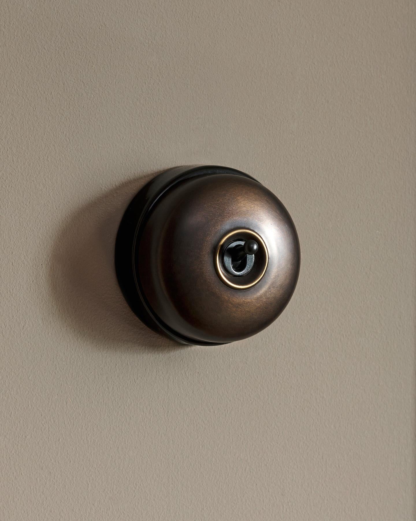 The Dolly Toggle Switch - Oxidised Brass, Black Base, Intermediate