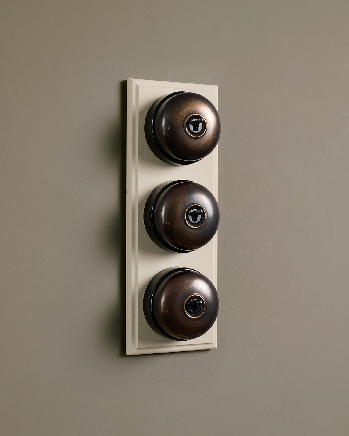 The Dolly Toggle Switch (3 Gang & Primed Maple Pattress) - Oxidised Brass with Black Base. TEST