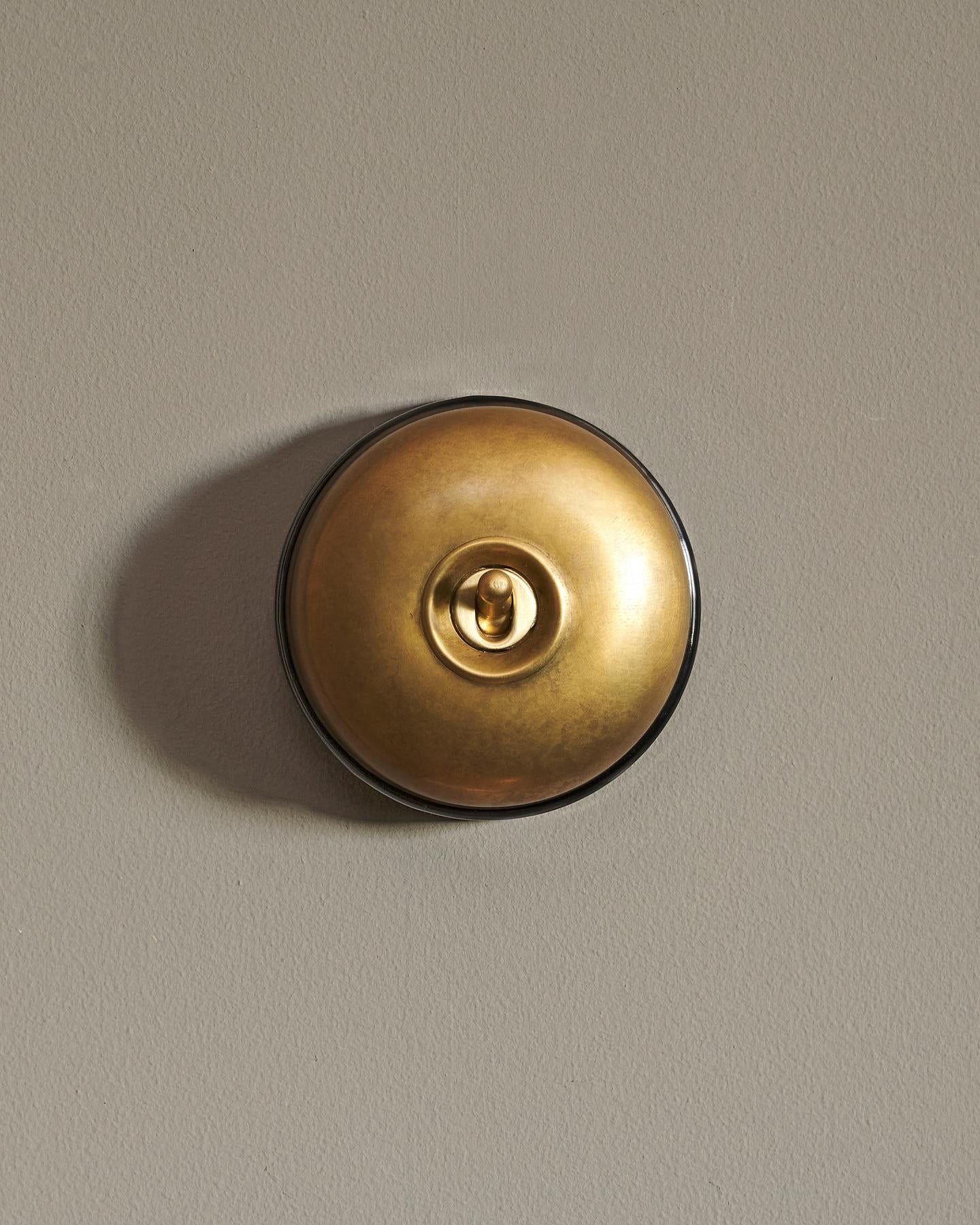 The Dolly Toggle Switch - Aged Brass, Black Base, Intermediate