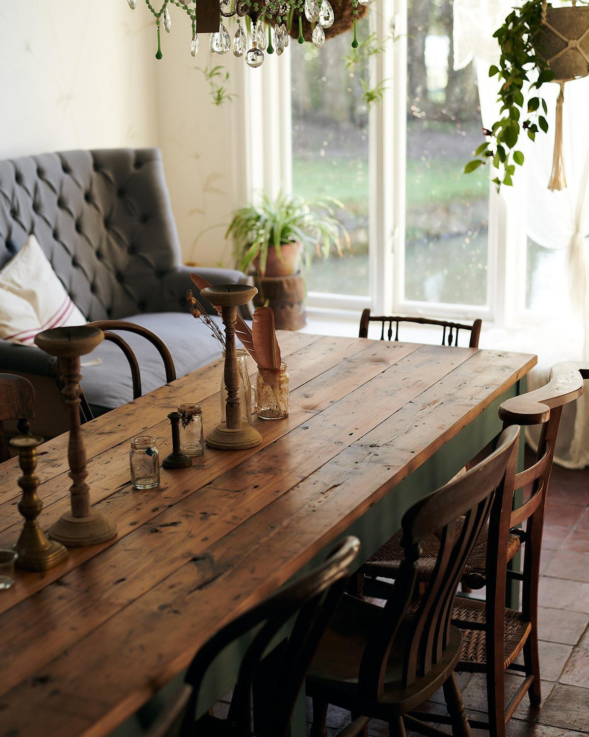 An oblique view of a rustic pine tabletop from a banquet-style dining table. TEST