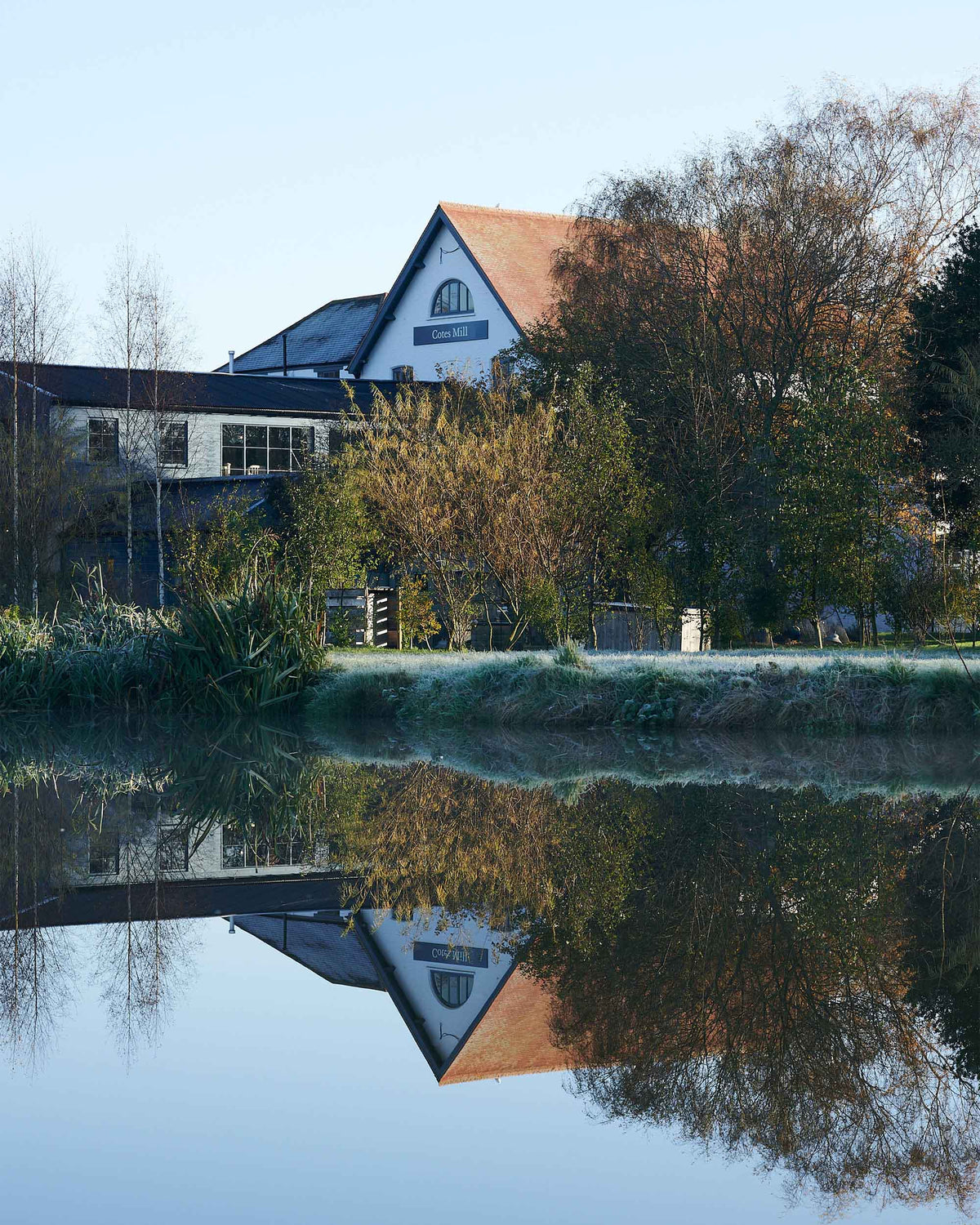 The home of deVOL kitchens in Leicestershire sits beside the Cotes pond and lush green British countryside.