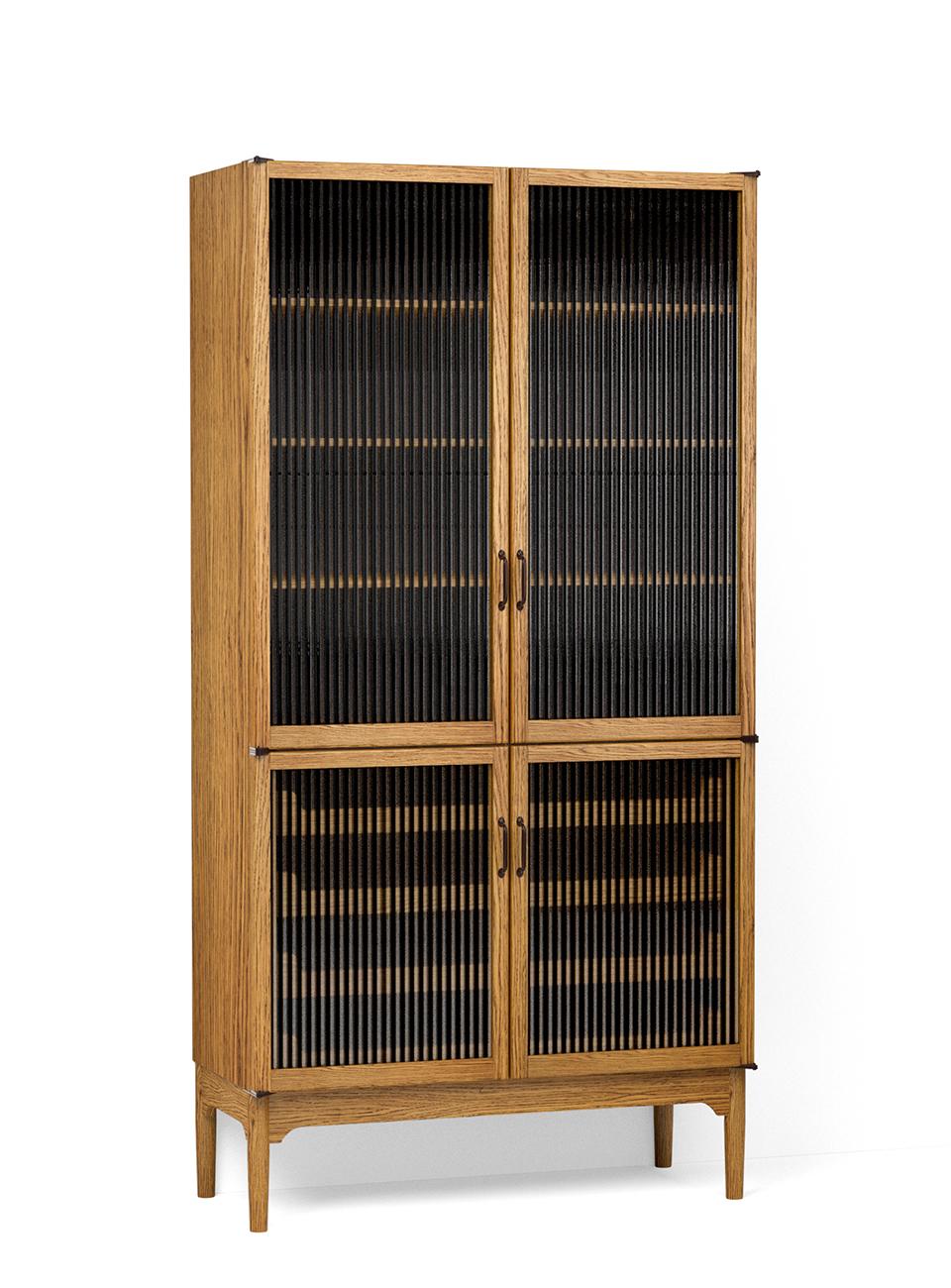 A render of an oak freestanding pantry cupboard from deVOL's Haberdasher's range, with two sets of reeded glazed doors, three fitted shelves at the top and four sliding drawers at the bottom.