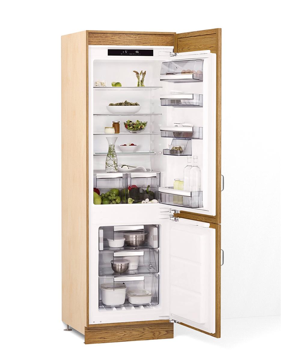 A render of an oak full height fridge/freezer cupboard from deVOL's Haberdasher's range.