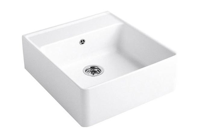A cut-out image of a traditional white ceramic sink.
