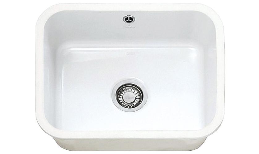 A cut-out image of a traditional white ceramic sink, suitable for undermount sink cabinets.