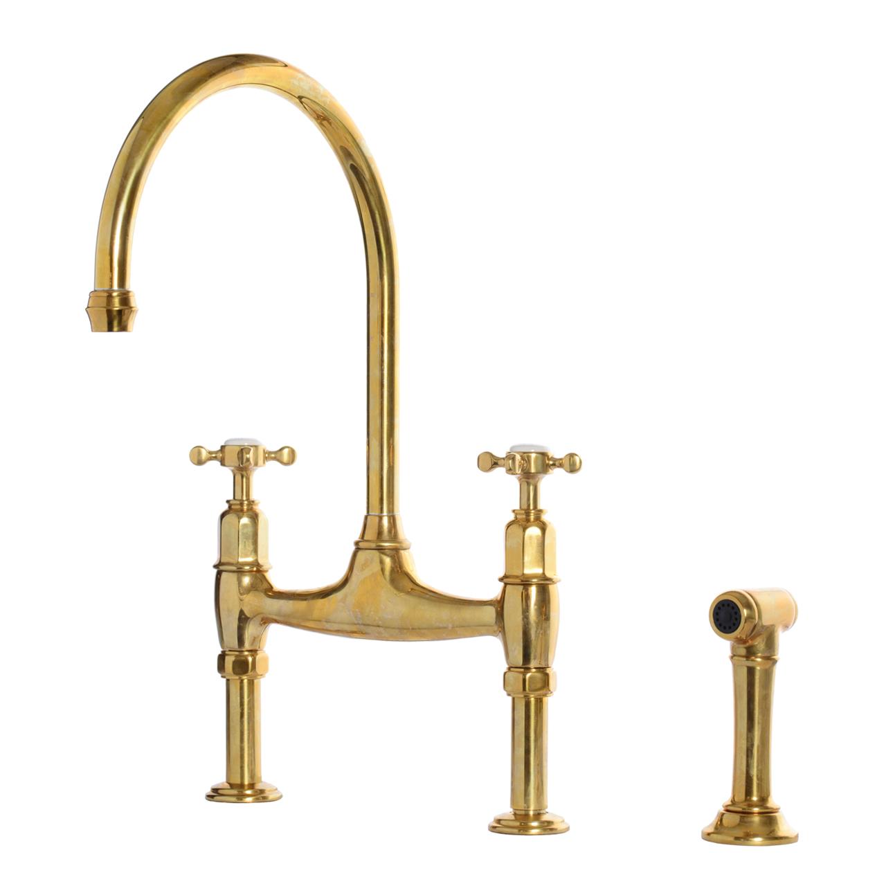 A cut-out image of a deVOL Ionian Tap with Rinse, a traditional style crosshead mixer tap, in our aged brass finish.