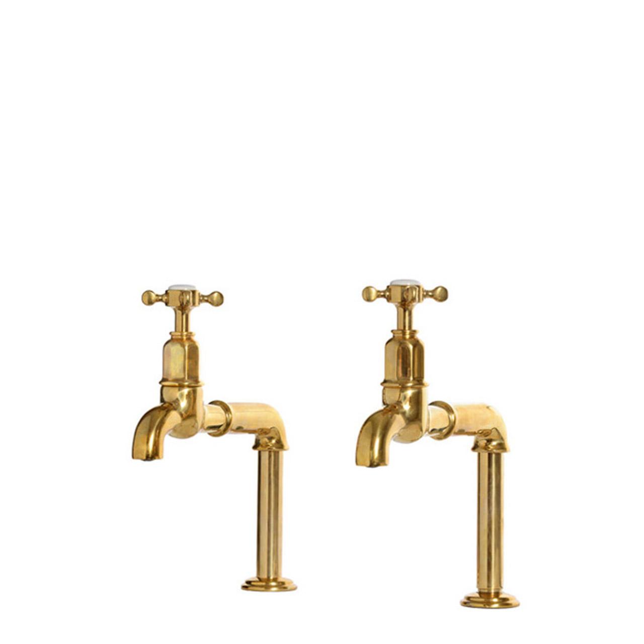 A cut-out image of deVOL Mayan Taps, a traditional style crosshead bib tap, in our aged brass finish.