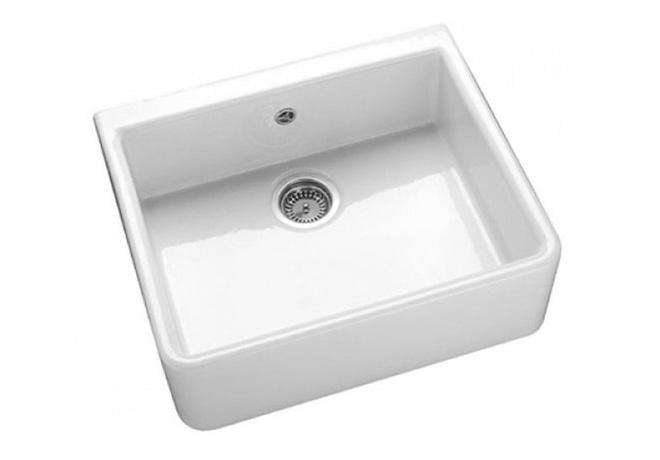 A cut-out image of a traditional white ceramic Belfast sink.