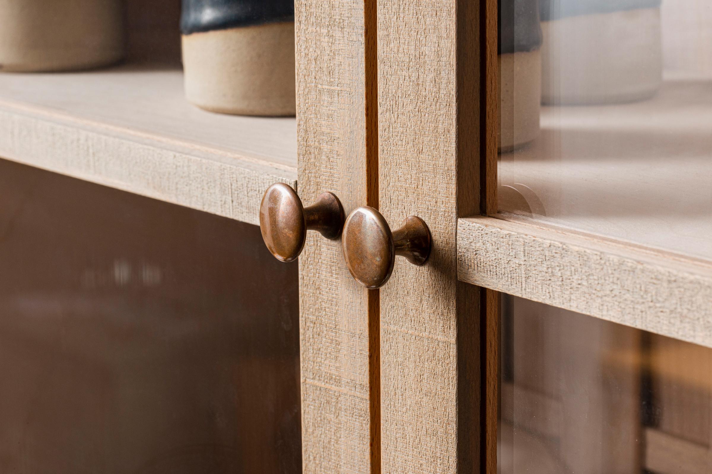 An aged copper knob from deVOL's Sebastian Cox range.