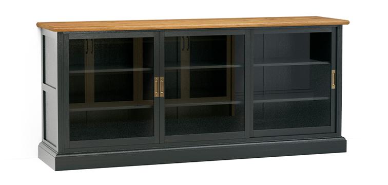 A render of a freestanding kitchen counter with glazed sliding doors, finished in black paint and fitted with an oak worktop.