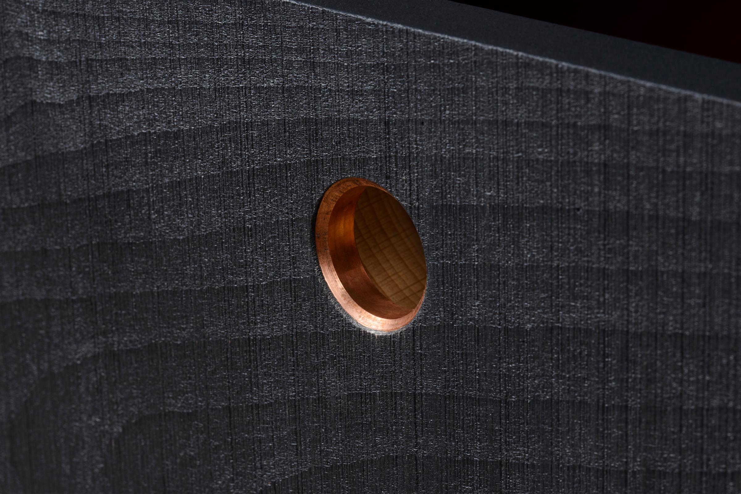 An aged copper ring handle from deVOL's Sebastian Cox range.
