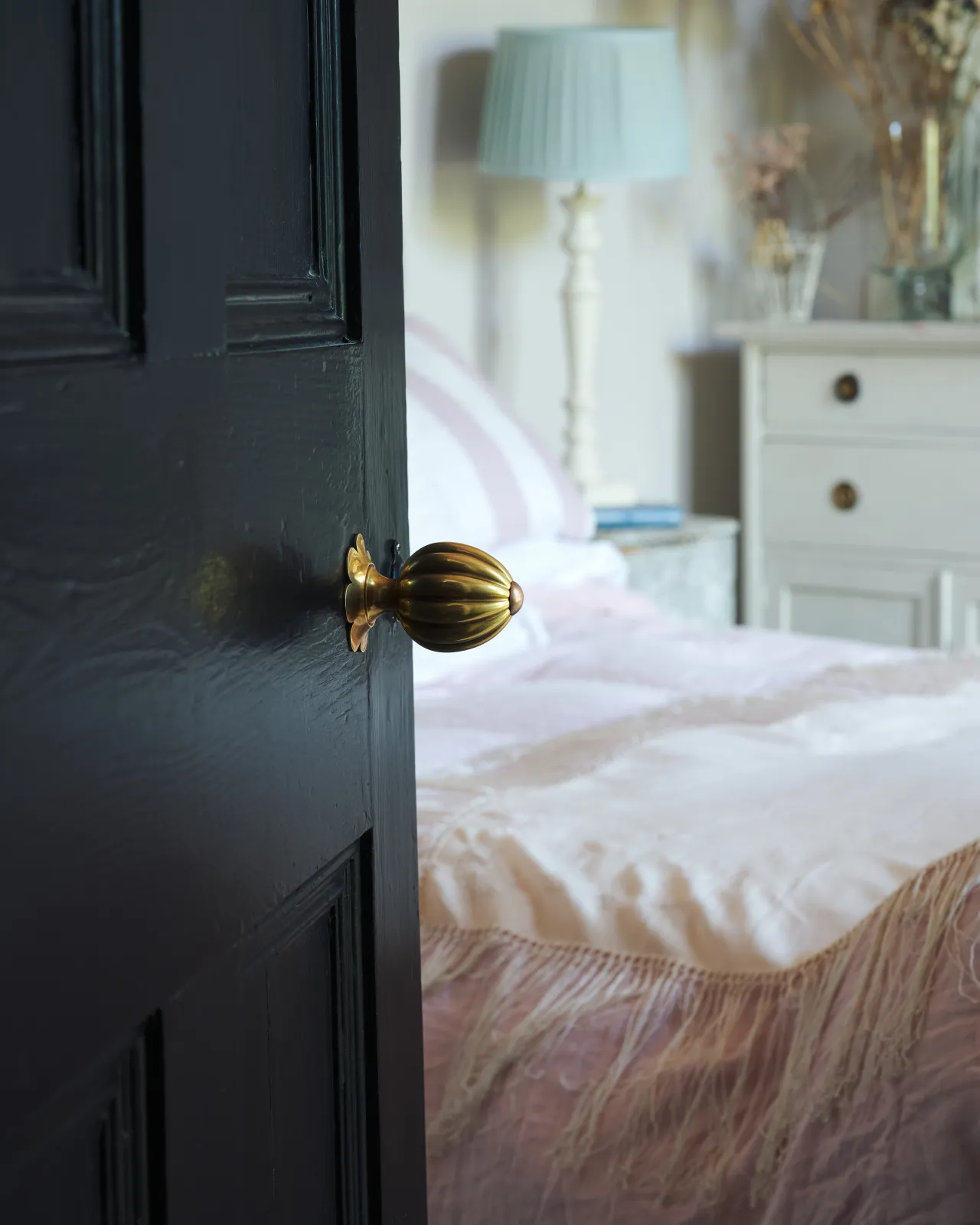 Marguerite Doorknob on a black door.