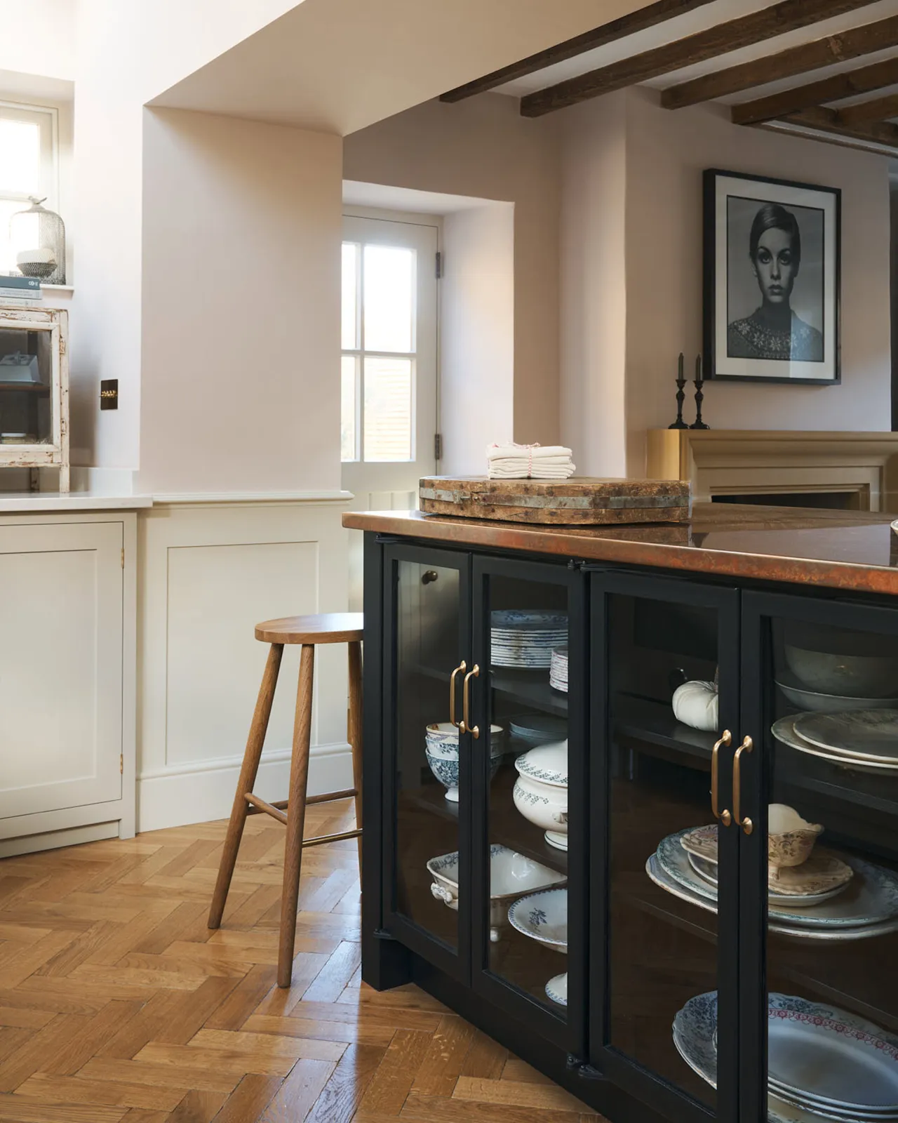 A classic Shaker kitchen island with a Helen stool is paired perfectly with the oak parquet flooring with a warm aged finish.