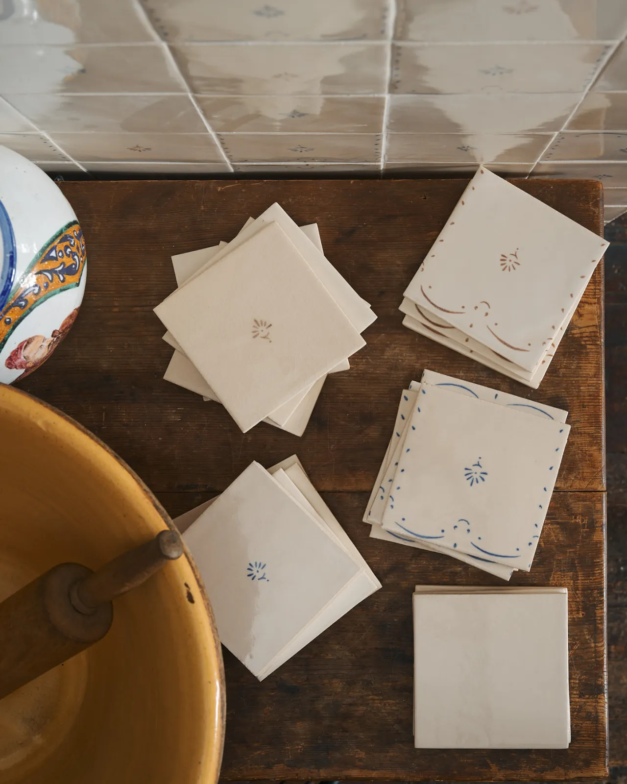 A flat lay image looking down at a selection of deVOL Ditsy Delft Tiles.