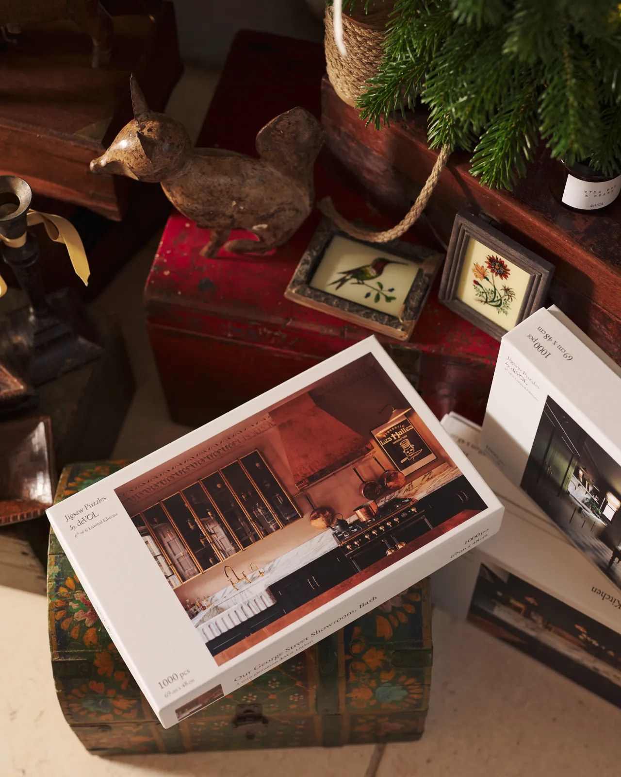A top down shot of deVOL's jigsaw puzzle by the christmas tree.