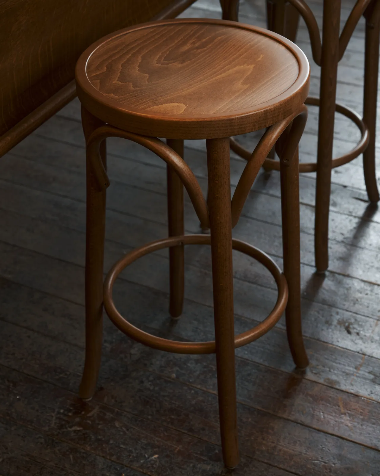 a close up of the classic bentwood cafe stool.
