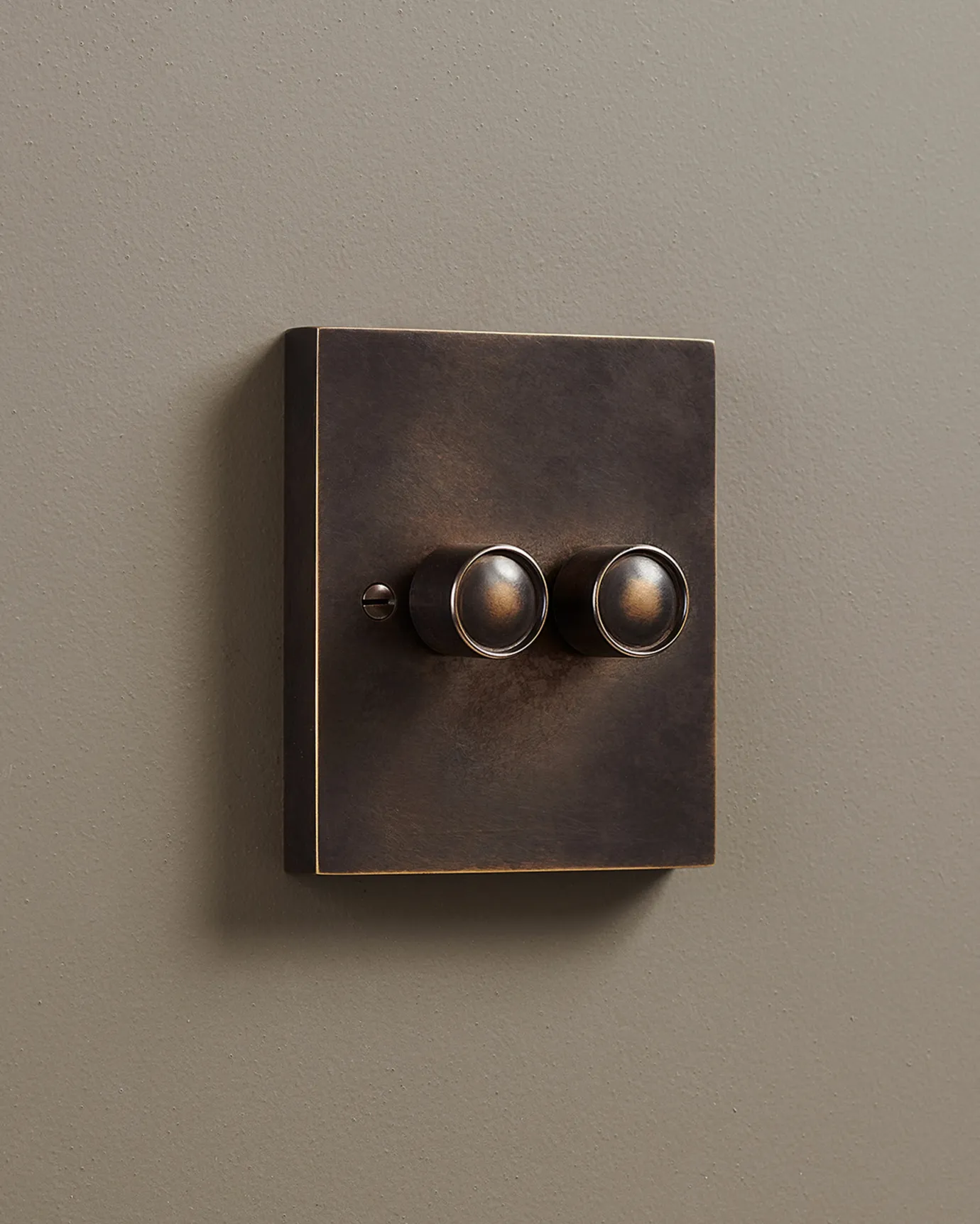 A 2 gang Box Dimmer Switch in an Oxidised Brass finish.